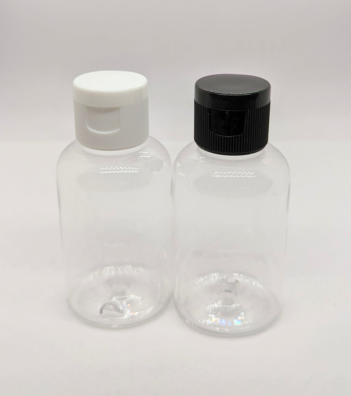 Clear Boston Round Plastic Bottle with Black Flip Cap - 50ml